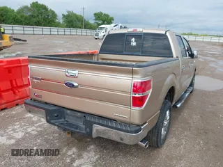 2014 Ford F-150 XL with VIN 1FTFW1CF5EKD00420, listed as a IAAI auction lot 41853974 with 160,472 mi miles and . Bid and sale history available at carsss.com. Image 4.