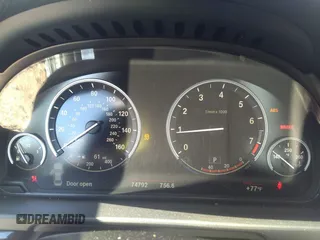 2015 BMW 5 Series 528i xDrive with VIN WBA5A7C55FD628489, listed as a IAAI auction lot 39752634 with 74,792 mi miles and . Bid and sale history available at carsss.com. Image 7.
