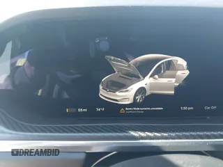 2022 Tesla Model S Plaid with VIN 5YJSA1E69NF486471, listed as a IAAI auction lot 41228818 with 49,207 mi miles and . Bid and sale history available at carsss.com. Image 17.