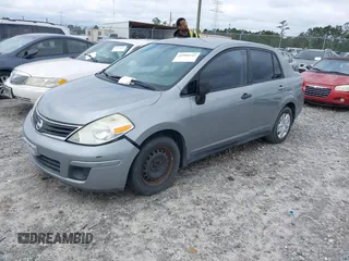 2010 Nissan Versa 1.8 S with VIN 3N1BC1AP1AL382273, listed as a IAAI auction lot 41980242 with 250,870 mi miles. Bid and sale history available at carsss.com. Image 2.