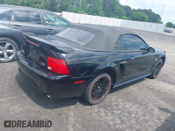 2003 Ford Mustang GT Deluxe z VIN 1FAFP45XX3F417295, wystawiony jako IAAI lot #42229765 z przebiegiem 161 488 mil mil oraz . Historia ofert i sprzedaży dostępna na DreamBid. Obrazek 4.