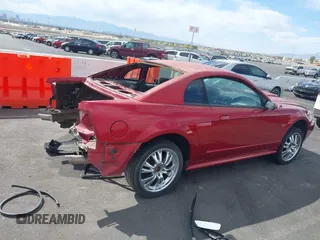 2003 Ford Mustang GT Deluxe with VIN 1FAFP42X43F363173, listed as a IAAI auction lot 42086161 with 103,828 mi miles. Bid and sale history available at carsss.com. Image 12.