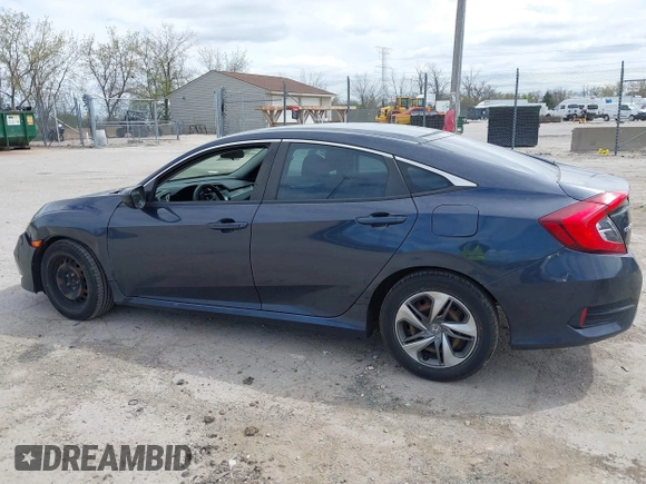 2019 Honda Civic LX with VIN 2HGFC2F61KH564474, listed as a IAAI auction lot 42156385 with 239,694 mi miles and . Bid and sale history available at DreamBid. Image 14.