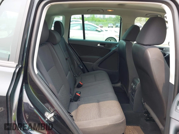 2013 Volkswagen Tiguan S with VIN WVGAV3AX2DW594334, listed as a IAAI auction lot 42405989 with 96,559 mi miles and . Bid and sale history available at DreamBid. Image 8.