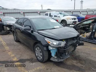2023 Kia Rio S with VIN 3KPA24AD5PE560704, listed as a IAAI auction lot 41546929 with 51,114 mi miles. Bid and sale history available at carsss.com. Image 1.