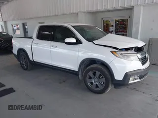 2020 Honda Ridgeline RTL-E z VIN 5FPYK3F71LB005028, wystawiony jako IAAI lot #42167883 z przebiegiem 81 882 mil mil oraz . Historia ofert i sprzedaży dostępna na DreamBid. Obrazek 1.