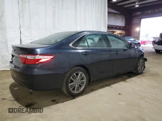 2015 Toyota Camry XLE with VIN 4T1BF1FK3FU077674, listed as a Copart auction lot 52679985 with 128,417 mi miles and Salvage Title. Bid and sale history available at DreamBid. Image 3.