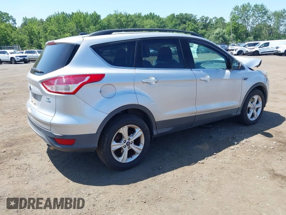 2014 Ford Escape SE with VIN 1FMCU9GX8EUA88526, listed as a IAAI auction lot 42578612 with 22,623 mi miles and . Bid and sale history available at DreamBid. Image 4.