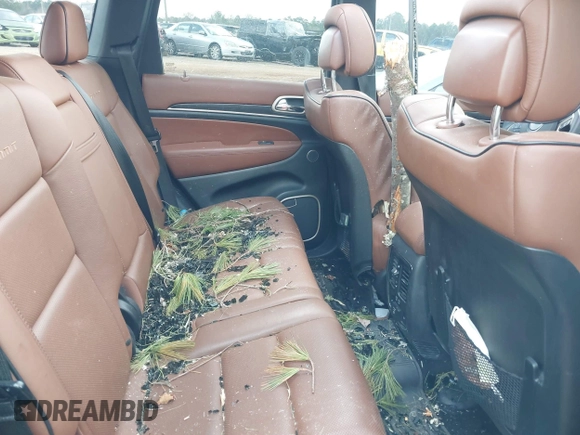 2015 Jeep Grand Cherokee Summit with VIN 1C4RJFJT1FC768707, listed as a IAAI auction lot 41863454 with 122,564 mi miles. Bid and sale history available at carsss.com. Image 8.