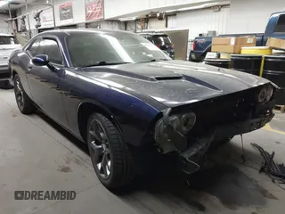 2016 Dodge Challenger SXT with VIN 2C3CDZAG4GH331563, listed as a IAAI auction lot 41551977 with 151,347 mi miles and . Bid and sale history available at DreamBid. Image 1.