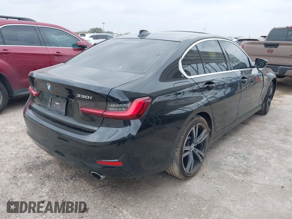 2022 BMW 3 Series 330i with VIN 3MW5R1J08N8C37393, listed as a IAAI auction lot 41712629 with 37,423 mi miles and . Bid and sale history available at DreamBid. Image 4.