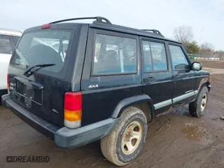 1999 Jeep Cherokee Sport with VIN 1J4FF68S0XL593508, listed as a IAAI auction lot 41526227 with 237,838 mi miles. Bid and sale history available at carsss.com. Image 4.