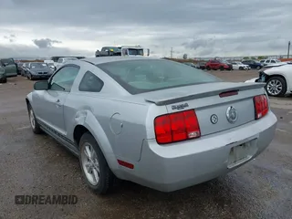 2007 Ford Mustang Deluxe with VIN 1ZVFT80N575245396, listed as a IAAI auction lot 41889599 with 319,148 mi miles. Bid and sale history available at carsss.com. Image 3.