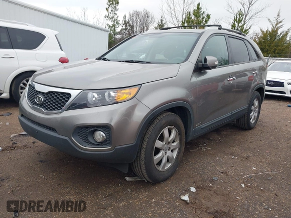 2012 Kia Sorento LX with VIN 5XYKTDA21CG244973, listed as a IAAI auction lot 41268549 with 211,858 mi miles. Bid and sale history available at carsss.com. Image 2.