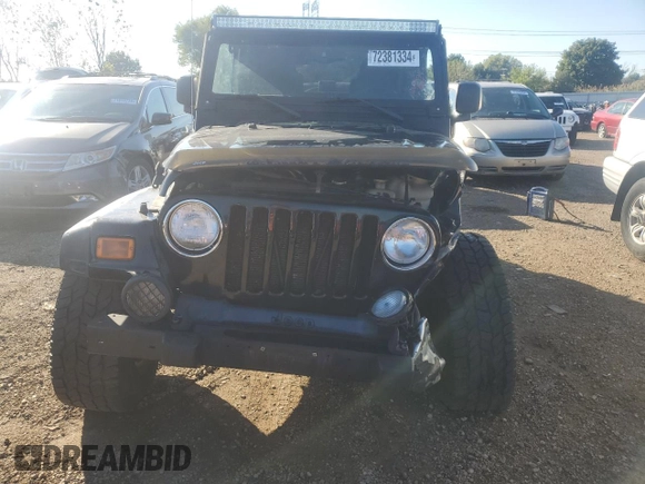 2004 Jeep Wrangler Rubicon with VIN 1J4FA69S44P734355, listed as a Copart auction lot 72381334 with 113,024 mi miles and Salvage Title. Bid and sale history available at carsss.com. Image 5.