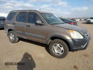 2004 Honda CR-V LX with VIN JHLRD68484C022888, listed as a IAAI auction lot 41949609 with 201,597 mi miles and . Bid and sale history available at carsss.com. Image 1.