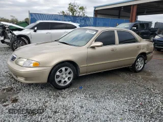 2001 Mazda 626 LX with VIN 1YVGF22CX15238033, listed as a Copart auction lot 47245985 with 91,735 mi miles and Salvage Title. Bid and sale history available at carsss.com. Image 1.