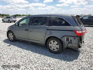 2013 Honda Odyssey LX with VIN 5FNRL5H26DB030757, listed as a Copart auction lot 51913635 with 104,654 mi miles and Salvage Title. Bid and sale history available at carsss.com. Image 2.
