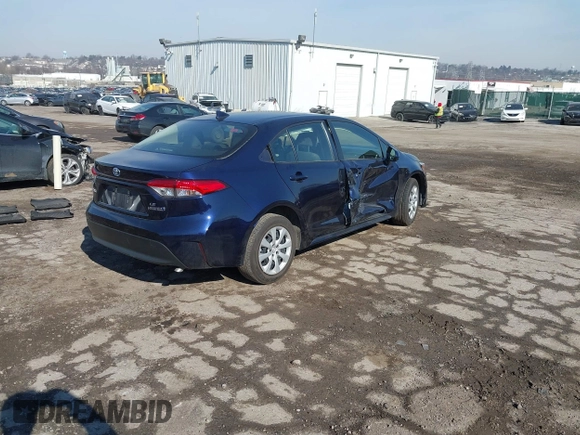 2023 Toyota Corolla Hybrid LE with VIN JTDBCMFE7PJ005985, listed as a IAAI auction lot 41574856 with 31,568 mi miles. Bid and sale history available at carsss.com. Image 4.