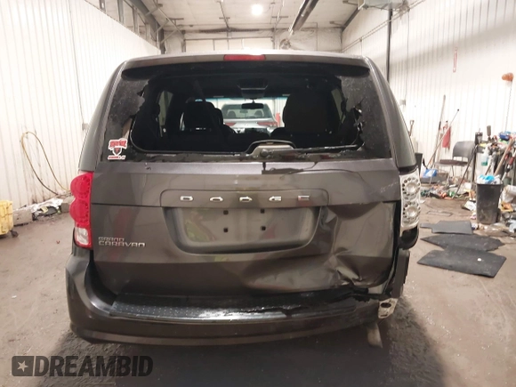 2016 Dodge Grand Caravan SE with VIN 2C4RDGBGXGR219689, listed as a IAAI auction lot 41675960 with 112,045 mi miles and . Bid and sale history available at DreamBid. Image 17.
