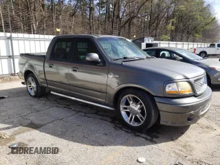 2002 Ford F-150 Harley Davidson with VIN 1FTRW07312KD72573, listed as a Copart auction lot 44971685 with 0 mi miles and Clean Title. Bid and sale history available at carsss.com. Image 4.