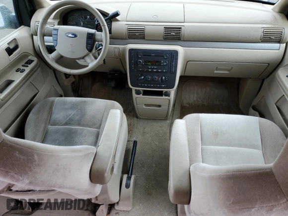 2005 Ford Freestar z VIN 2FMDA57275BA59115, wystawiony jako Copart lot #57058445 z przebiegiem 100 831 mil mil oraz Szkoda całkowita • Salvage title. Historia ofert i sprzedaży dostępna na DreamBid. Obrazek 8.