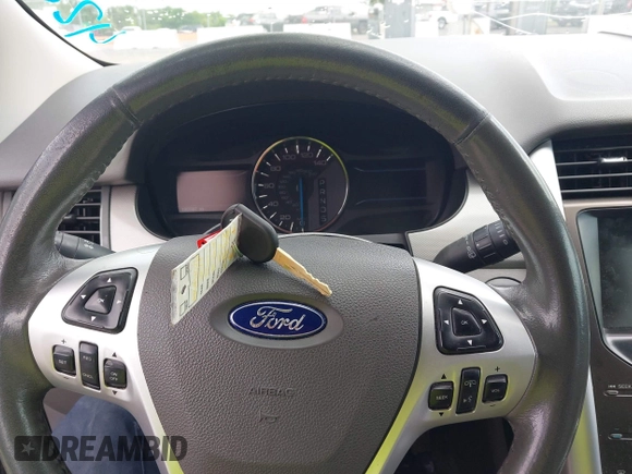 2014 Ford Edge SEL z VIN 2FMDK4JC3EBA01026, wystawiony jako IAAI lot #42229792 z przebiegiem 190 087 mil mil oraz . Historia ofert i sprzedaży dostępna na DreamBid. Obrazek 11.