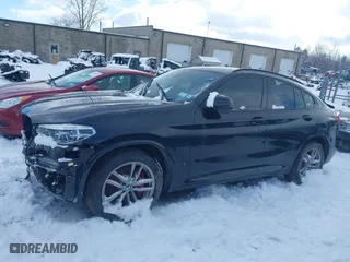 2021 BMW X4 M40i with VIN 5UX2V5C05M9H02711, listed as a IAAI auction lot 41675953 with 26,652 mi miles. Bid and sale history available at carsss.com. Image 15.