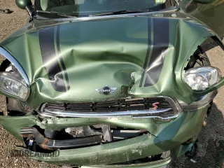 2015 MINI Countryman S with VIN WMWZC5C53FWP49039, listed as a Copart auction lot 60200335 with Not provided miles and Salvage title. Bid and sale history available at DreamBid. Image 12.