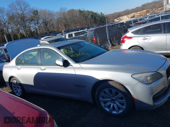 2014 BMW 7 Series 740i with VIN WBAYA6C54ED144450, listed as a IAAI auction lot 41680060 with 999,999 mi miles. Bid and sale history available at carsss.com. Image 12.
