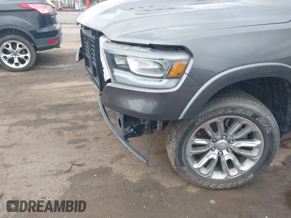 2022 Ram 1500 Laramie with VIN 1C6SRFJT3NN400159, listed as a IAAI auction lot 42167812 with 16,790 mi miles and . Bid and sale history available at DreamBid. Image 18.