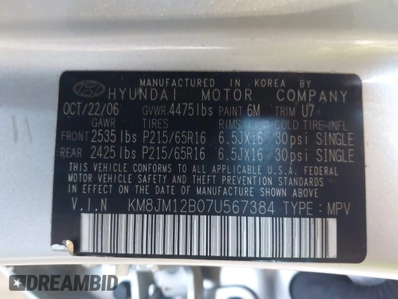 2007 Hyundai Tucson GLS with VIN KM8JM12B07U567384, listed as a IAAI auction lot 41779454 with 152,660 mi miles. Bid and sale history available at carsss.com. Image 8.