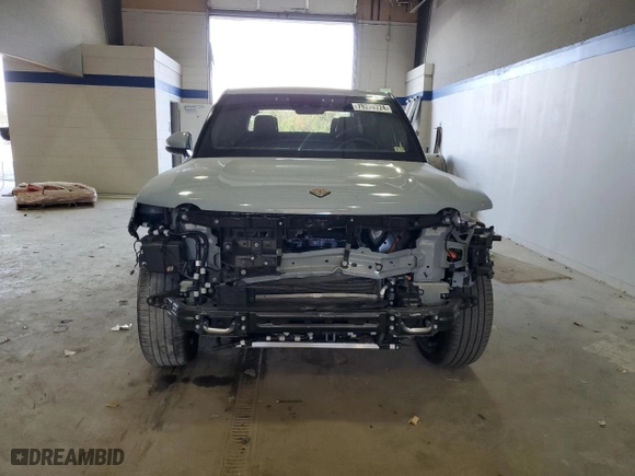 2023 Rivian R1T Adventure with VIN 7FCTGAAA8PN025421, listed as a Copart auction lot 79226724 with 139 mi miles and Salvage Title. Bid and sale history available at carsss.com. Image 5.