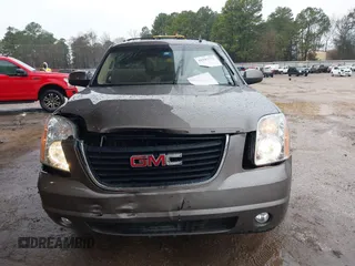 2014 GMC Yukon SLT with VIN 1GKS1CE00ER164663, listed as a IAAI auction lot 41547771 with 178,998 mi miles. Bid and sale history available at carsss.com. Image 12.