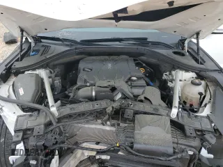 2022 Genesis GV70 2.5T z VIN KMUMADTB4NU061075, wystawiony jako Copart lot #51182065 z przebiegiem 50 457 mil mil oraz Szkoda całkowita • Salvage title. Historia ofert i sprzedaży dostępna na DreamBid. Obrazek 12.