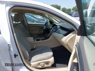 2015 Ford Taurus SE with VIN 1FAHP2D8XFG105029, listed as a IAAI auction lot 42068632 with 164,098 mi miles and . Bid and sale history available at carsss.com. Image 5.
