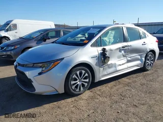 2020 Toyota Corolla Hybrid LE with VIN JTDEBRBE1LJ019992, listed as a IAAI auction lot 41761652 with 121,294 mi miles. Bid and sale history available at carsss.com. Image 19.