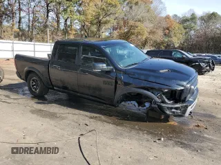 2017 Ram 1500 Rebel z VIN 1C6RR6YT7HS523912, wystawiony jako Copart lot #83148244 z przebiegiem Nie podano mil oraz Szkoda całkowita • Salvage title. Historia ofert i sprzedaży dostępna na DreamBid. Obrazek 4.
