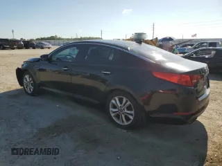 2011 Kia Optima EX z VIN KNAGN4A79B5183789, wystawiony jako Copart lot #59018985 z przebiegiem 203 137 mil mil oraz Szkoda całkowita • Salvage title. Historia ofert i sprzedaży dostępna na DreamBid. Obrazek 2.