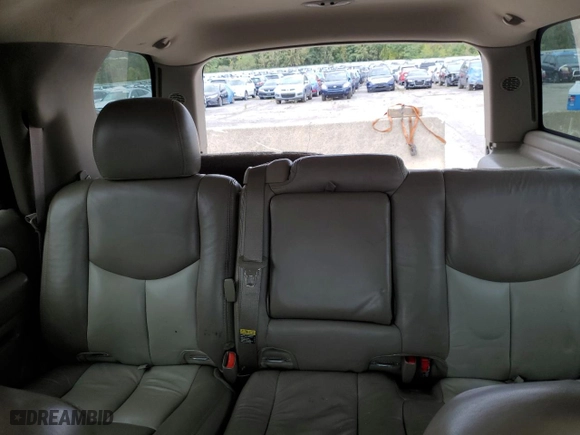 2004 GMC Yukon Denali with VIN 1GKEK63U94J135340, listed as a Copart auction lot 74230534 with 164,235 mi miles and Salvage Title. Bid and sale history available at carsss.com. Image 10.