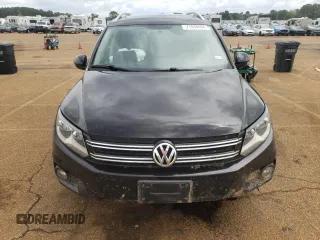 2014 Volkswagen Tiguan SEL with VIN WVGAV3AX5EW558929, listed as a Copart auction lot 71004684 with 125,628 mi miles and Clean title. Bid and sale history available at DreamBid. Image 5.
