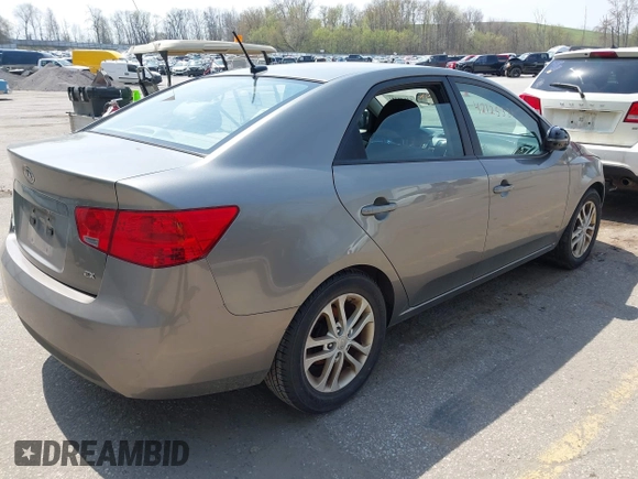 2011 Kia Forte EX with VIN KNAFU4A22B5405396, listed as a IAAI auction lot 42125381 with 209,300 mi miles. Bid and sale history available at carsss.com. Image 4.