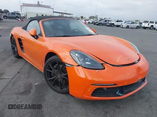 2018 Porsche 718 Boxster z VIN WP0CA2A81JS210719, wystawiony jako IAAI lot #41998898 z przebiegiem 49 369 mil mil oraz . Historia ofert i sprzedaży dostępna na DreamBid. Obrazek 1.