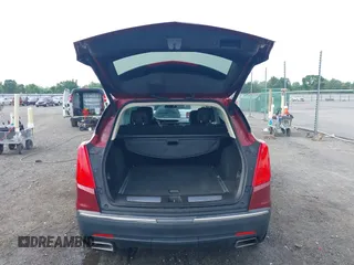 2018 Cadillac XT5 Premium Luxury FWD z VIN 1GYKNERS2JZ242842, wystawiony jako IAAI lot #42297159 z przebiegiem 72 008 mil mil oraz . Historia ofert i sprzedaży dostępna na DreamBid. Obrazek 17.