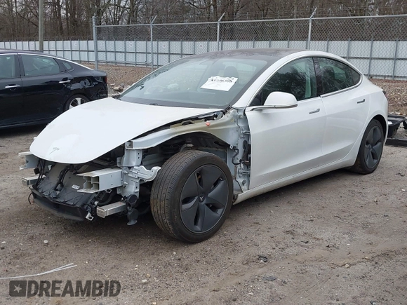 2020 Tesla Model 3 Standard Range Plus with VIN 5YJ3E1EA1LF799766, listed as a IAAI auction lot 41386508 with 90,000 mi miles. Bid and sale history available at carsss.com. Image 22.