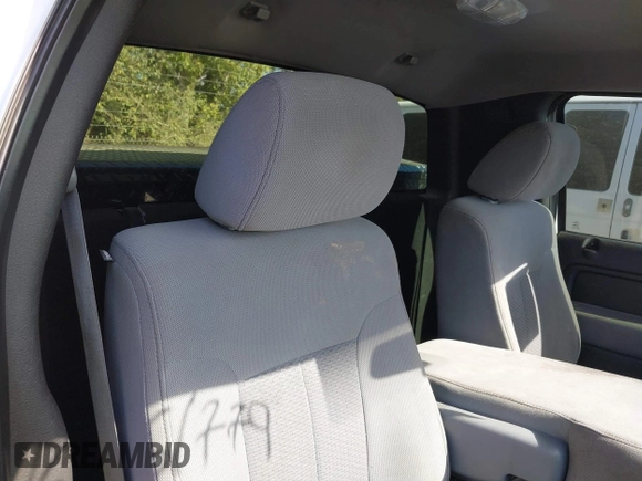 2012 Ford F-150 XL with VIN 1FTPF1CF7CKE24237, listed as a IAAI auction lot 40561779 with 185,152 mi miles and . Bid and sale history available at DreamBid. Image 8.