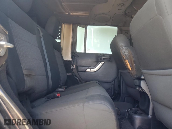 2012 Jeep Wrangler Unlimited Call of Duty MW3 with VIN 1C4BJWFGXCL148883, listed as a Copart auction lot 53162705 with 111,900 mi miles and Salvage title. Bid and sale history available at DreamBid. Image 12.