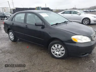 2004 Toyota Corolla CE with VIN 2T1BR32E14C260041, listed as a IAAI auction lot 42026930 with 180,814 mi miles. Bid and sale history available at carsss.com. Image 1.