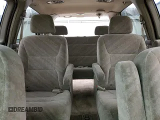 2004 Honda Odyssey EX with VIN 5FNRL186X4B127827, listed as a Copart auction lot 51602565 with 182,127 mi miles and Salvage Title. Bid and sale history available at DreamBid. Image 10.