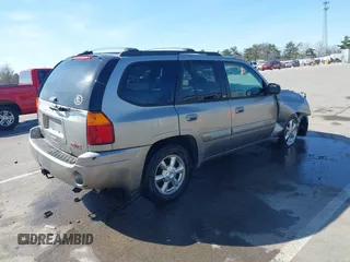 2002 GMC Envoy SLT z VIN 1GKDT13S122114452, wystawiony jako IAAI lot #42048616 z przebiegiem 259 545 mil mil oraz . Historia ofert i sprzedaży dostępna na DreamBid. Obrazek 4.